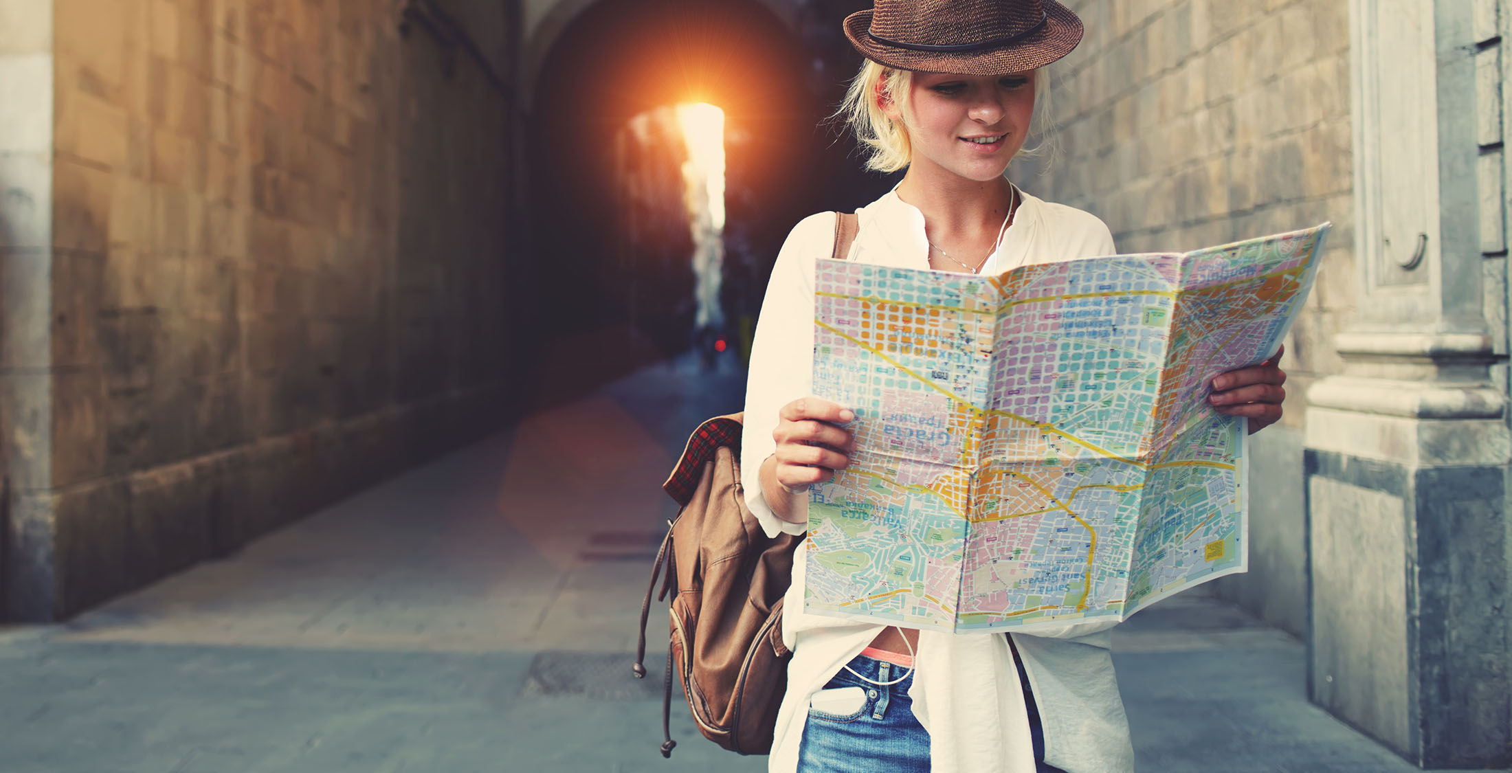 Opportunity cost girl reading map outside
