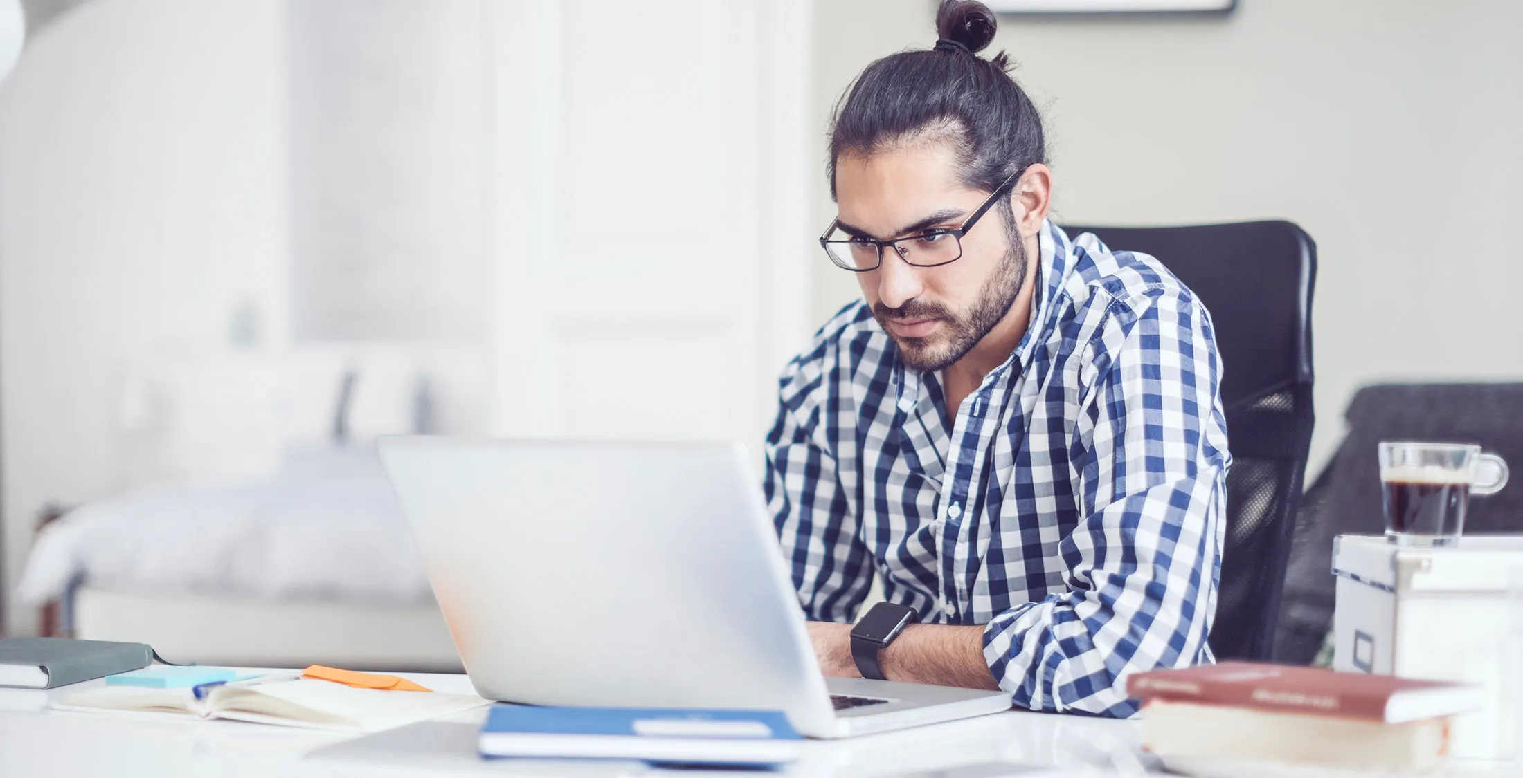 Young man is working at home