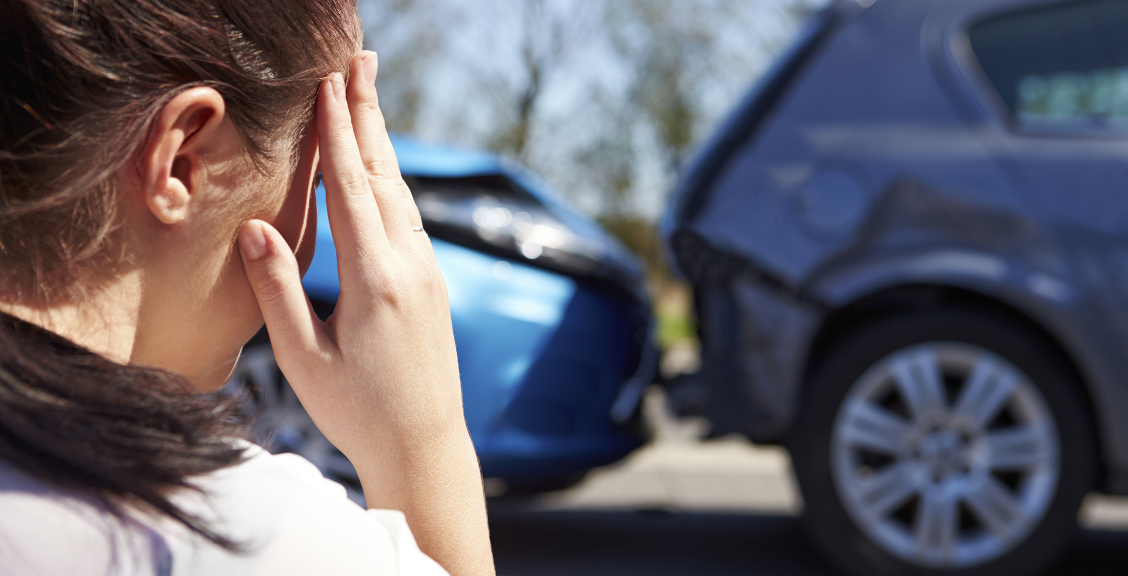 You fail to plan for irregular expenses. Stressed Driver Sitting At Roadside After Traffic Accident