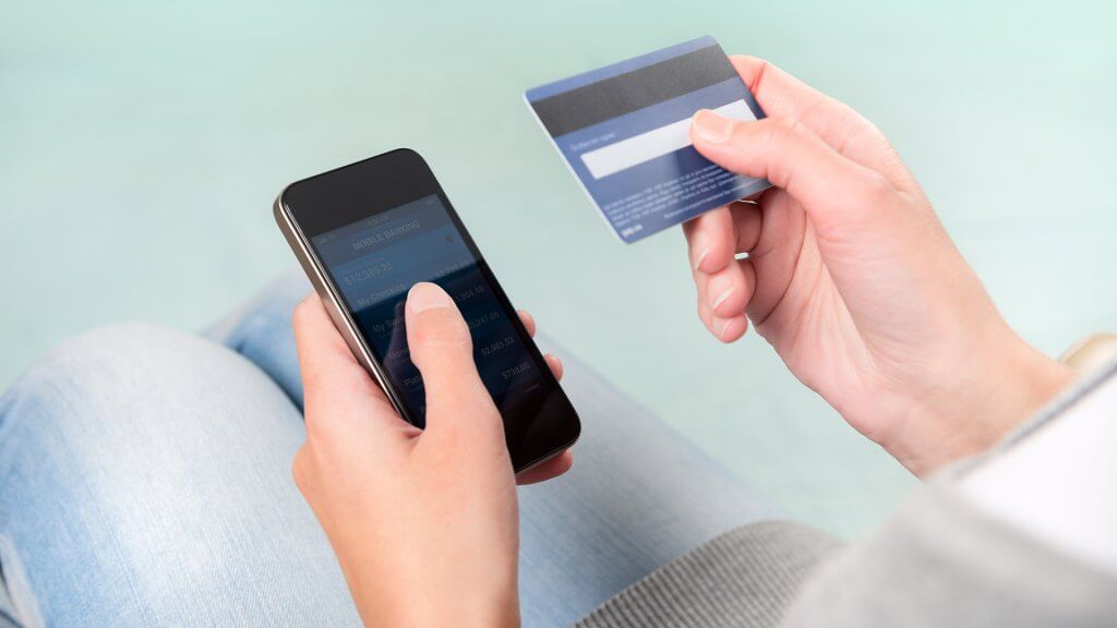 Pay Off Balances Every Month entering credit card information into phone