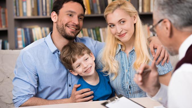 happy young couple with a small child
