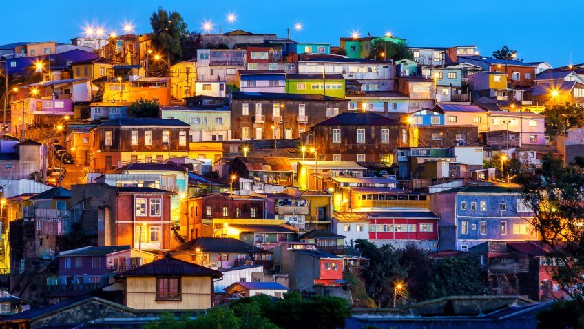 How Much to Tip When Traveling to These 25 Countries, The historic quarter of Valparaiso in Chile at night