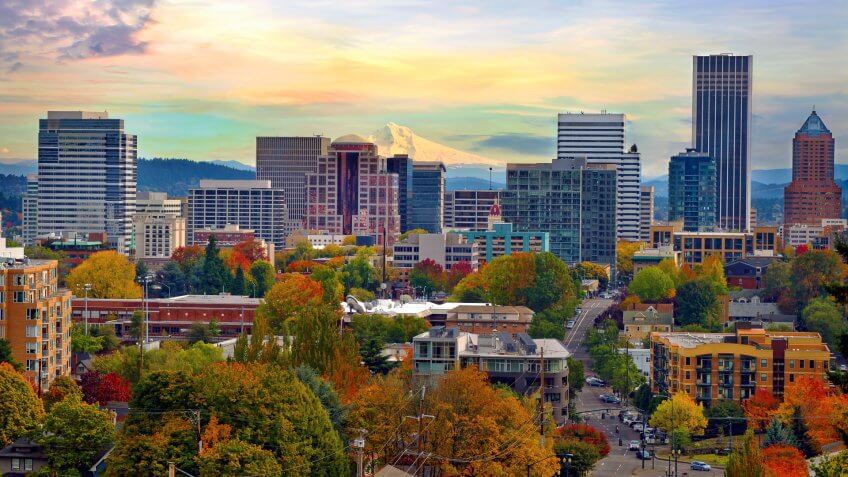 One beautiful Autumn day in Portland Oregon downtown from Vista Bridge with view of Mount Hood City Skyline and Trees with Fall Color Foliage.