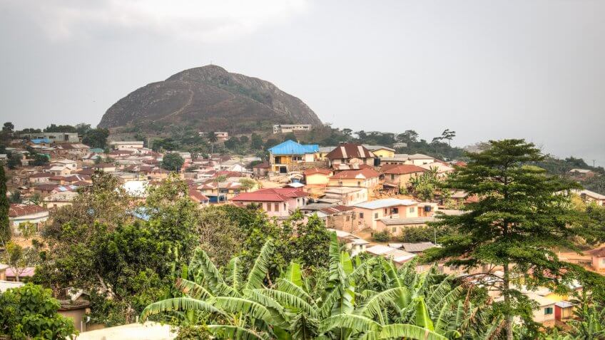 View over the town of Amedzofe with its green surroundings and the mountain in the background in the Volta Region, Ghana.