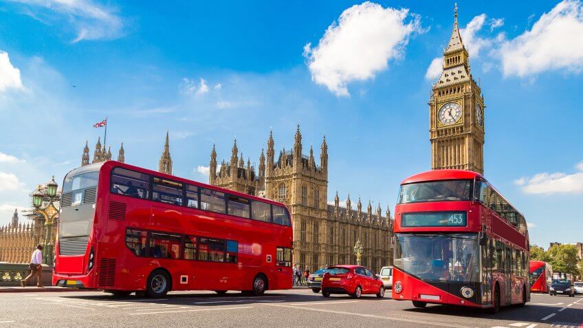 Big Ben, England, How Much to Tip When Traveling to These 25 Countries, United Kingdom, Westminster Bridge and red double decker bus in London