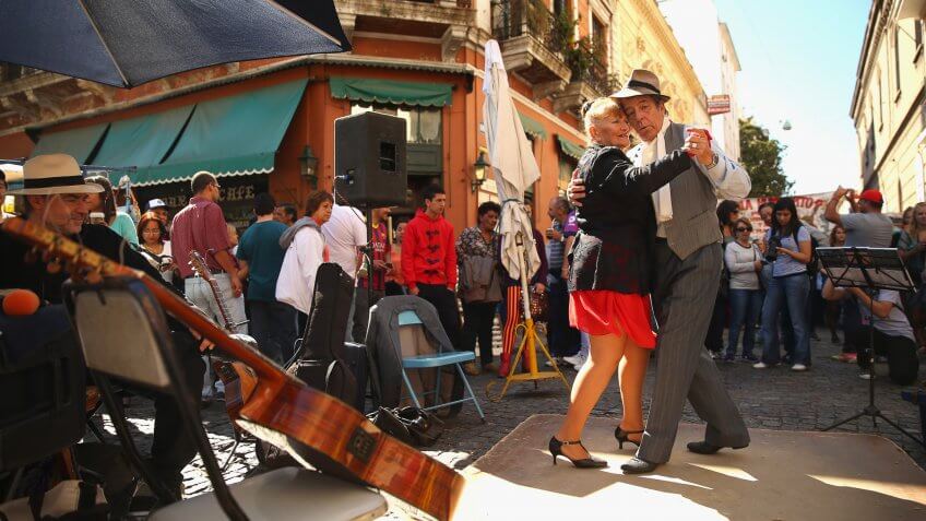 BUENOS AIRES, ARGENTINA - SEPTEMBER 08: Dancers perform a Tango at Plaza Dorrego in San Telmo on September 8, 2013 in Buenos Aires, Argentina.