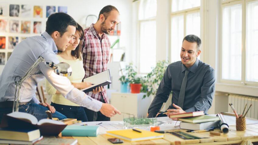 Young creatives working in an office