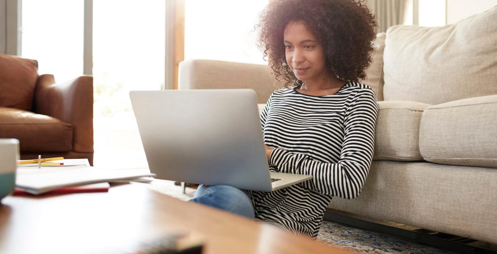 Picking stocks should not be an impulse decision. woman on laptop in home