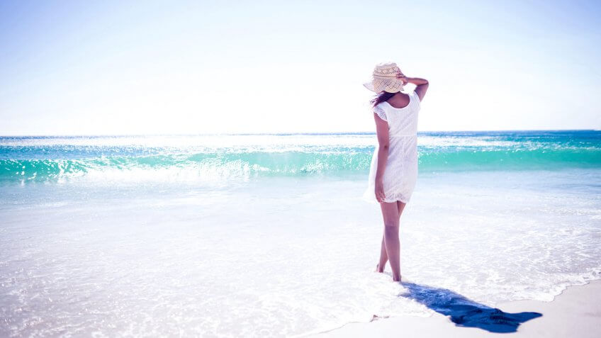 woman walking along the beach