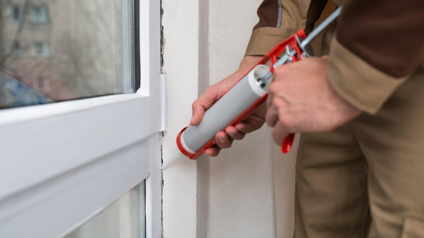 caulking around the windows