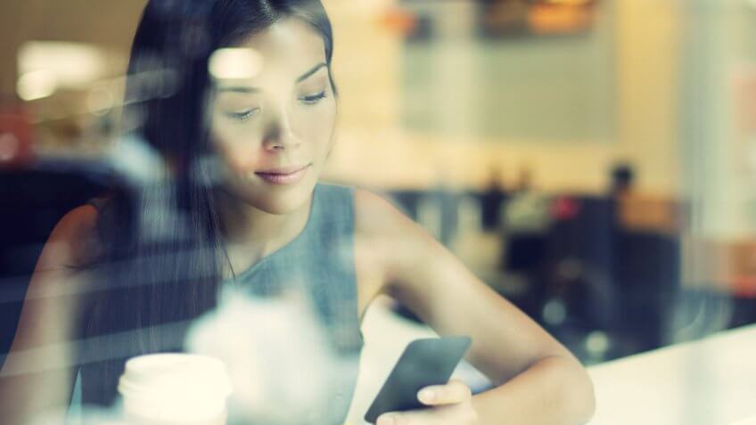 woman using her smartphone