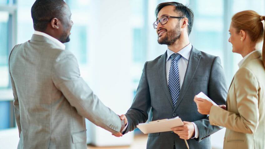 two men shaking hands