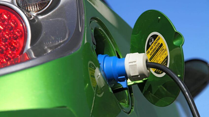 electric car plugged in to charge