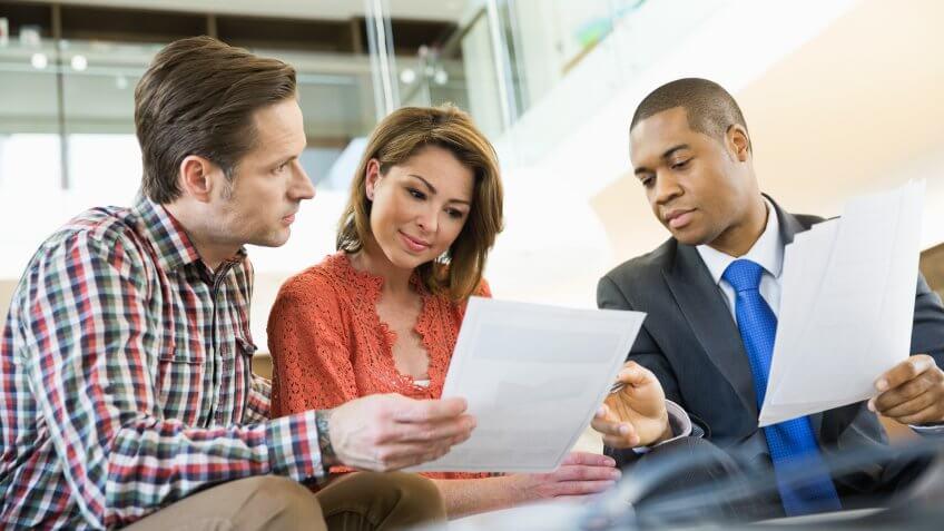 30-34 years, 30-34 years, 35-39 years, 45-49 years, advisor, african ethnicit, 35-39 years, 45-49 years, Alberta, Business, Businessman, Calgary, Canada, Caucasian, Explaining, Focus On Foreground, Investment, Mature Men, Multi-Ethnic Group, Occupation, Suit, Teamwork, Things to Know About High-Yield CDs, advisor, african ethnicity, bonding, business attire, client, color image, cooperation, copy space, day, discussing, domestic life, finance, financial advisor, future, guidance, heterosexual couple, holding, horizontal, indoors, investing, investor, lifestyle, livingroom, looking down, low angle view, man, mature adult, meeting, mid adult, mid adult men, mid adult women, paperwork, people, personal finance, photography, planning, reading, reviewing, sitting, smiling, three people, three quarter length, together, waist up, woman, working together