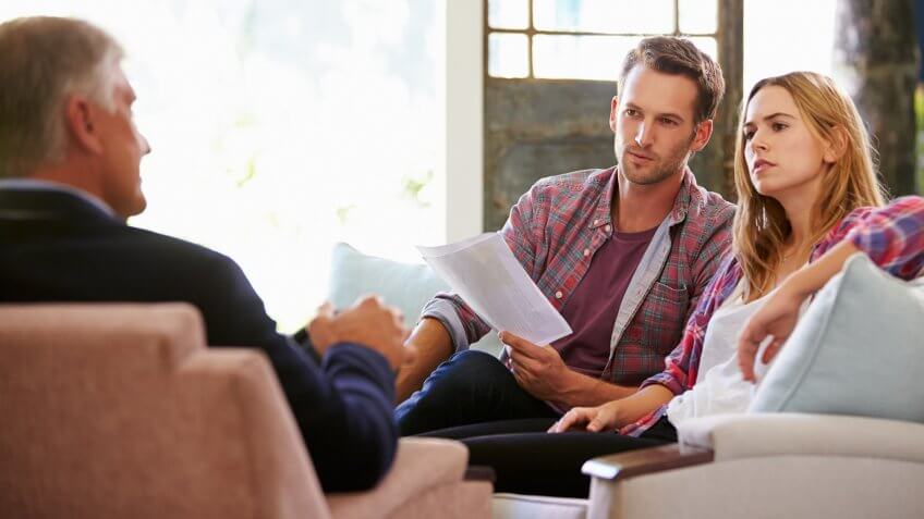 Couple Meeting With Financial Advisor.