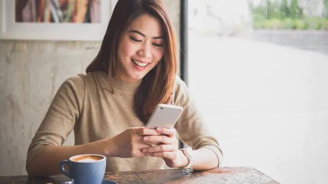 Asian, cafe, smartphone, woman