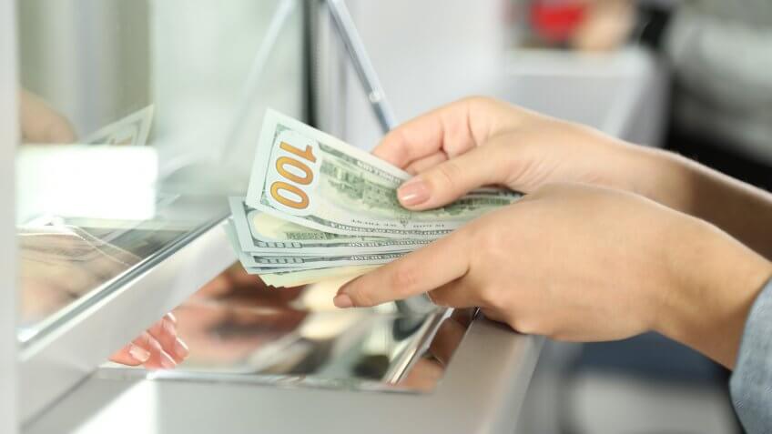 counting hundred dollar bills