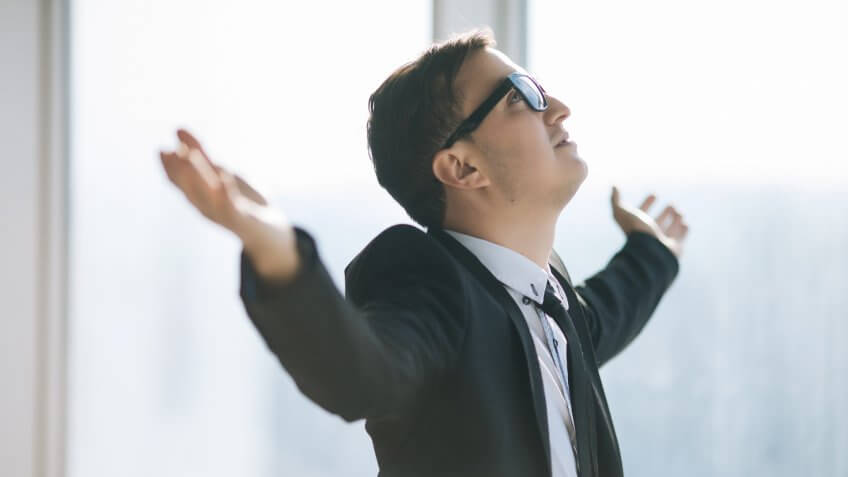 businessman raised hands.