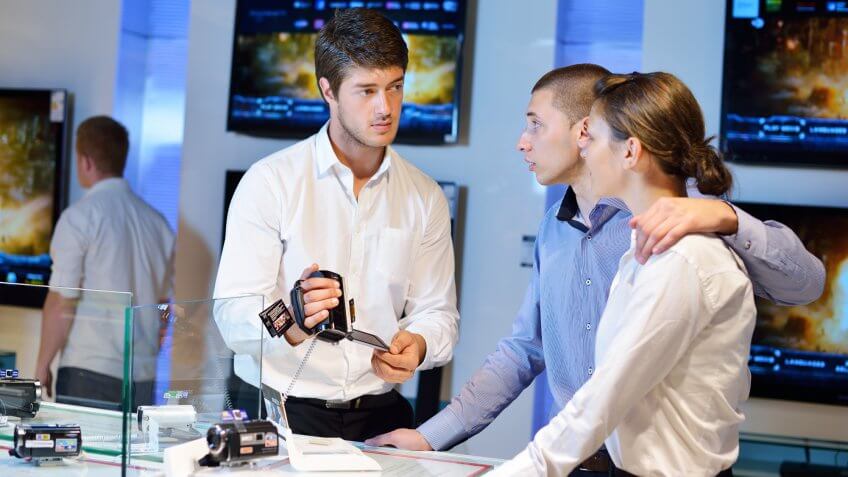 couple shopping for video recorders