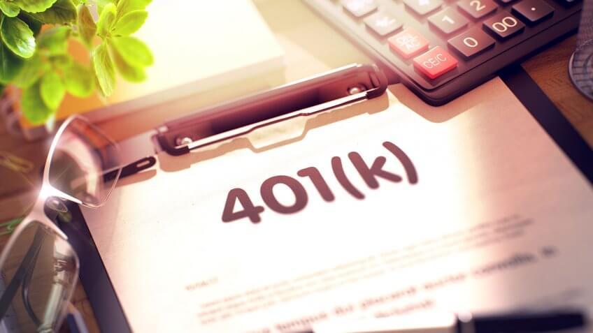 401k paperwork on desk with glasses