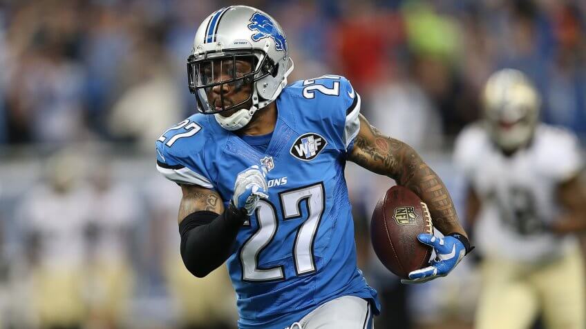 DETROIT, MI - OCTOBER 19: Glover Quin #27 of the Detroit Lions runs back the fourth quarter interception off Dree Brees (not in photo) during the game at Ford Field on October 19, 2014 in Detroit, Michigan.