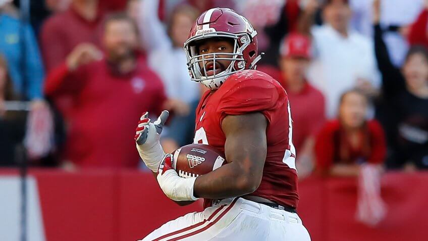 TUSCALOOSA, AL - OCTOBER 22: Jonathan Allen #93 of the Alabama Crimson Tide returns a fumble for a touchdown as he steps over Trevor Knight #8 of the Texas A&M Aggies at Bryant-Denny Stadium on October 22, 2016 in Tuscaloosa, Alabama.