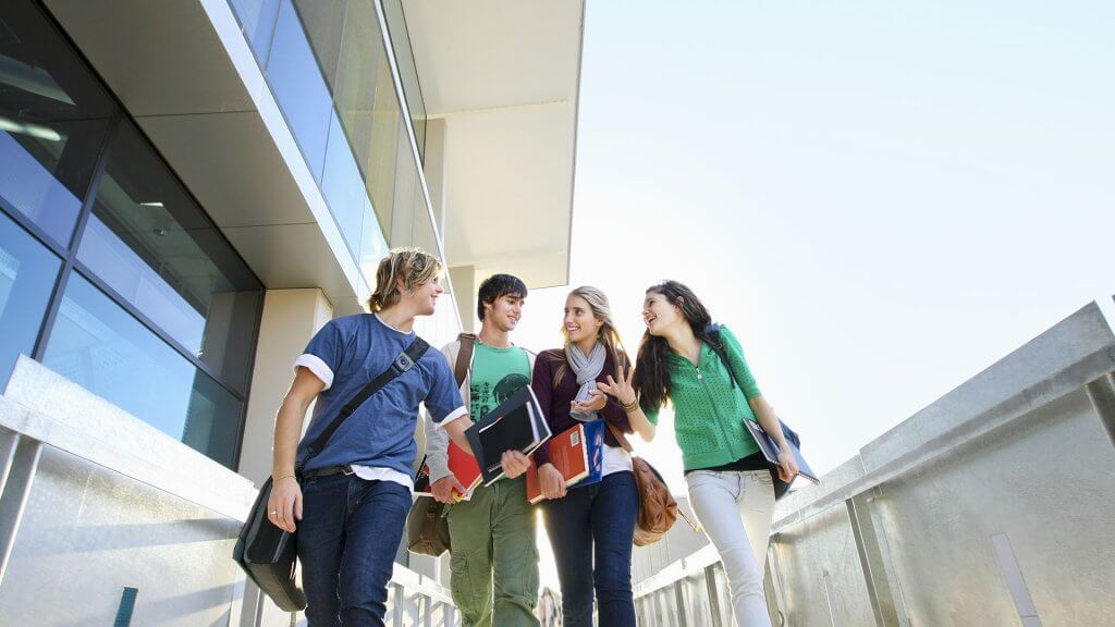 Paying for your kid's college education. group of students walking together