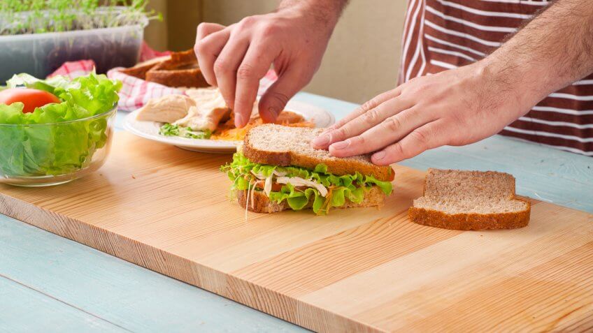 Man making sandwich Man making sandwich