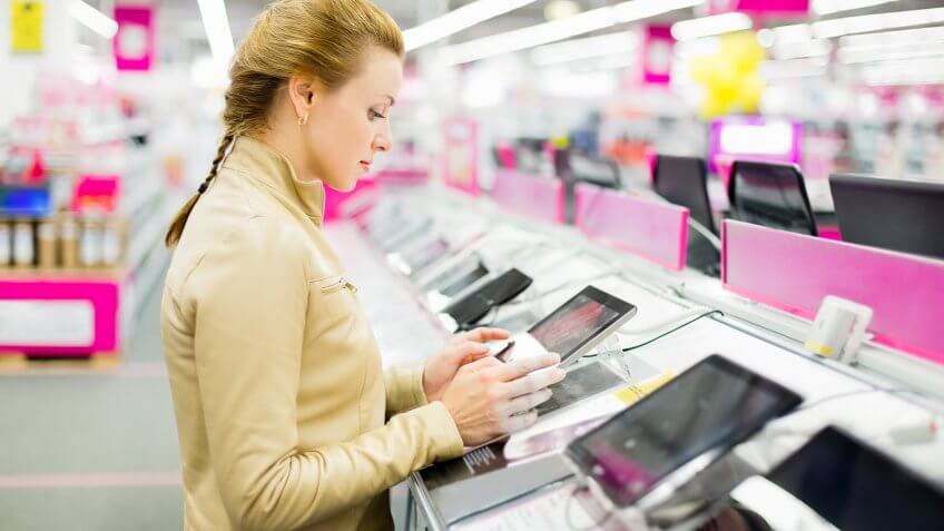 woman trying out a tablet