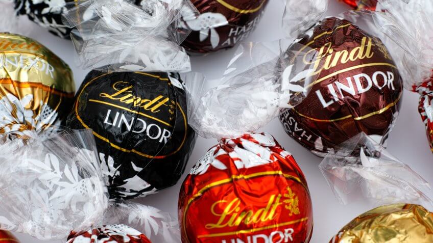 Tambov, Russian Federation - March 08, 2015: Lindt Lindor chocolate truffles on white background.