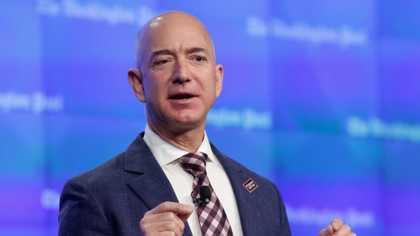 WASHINGTON, DC - JANUARY 28: Amazon founder and Washington Post owner Jeff Bezos delivers remarks during the opening ceremony of the media company's new location January 28, 2016 in Washington, DC.