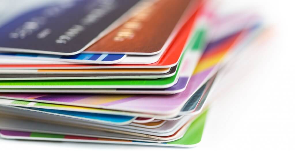 Get creative with expired cards. stack of credit cards