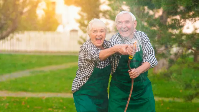 elderly couple gardening
