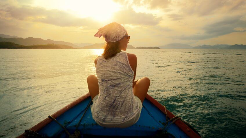 girl sitting on boat