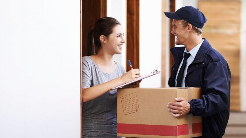 woman accepting a package delivery