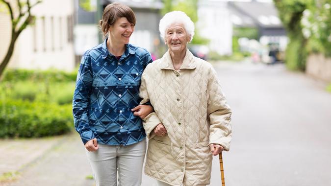 woman walking elderly senior