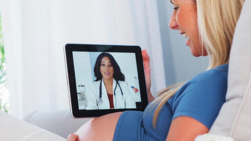 pregnant woman using telemedicine pregnant woman using telemedicine