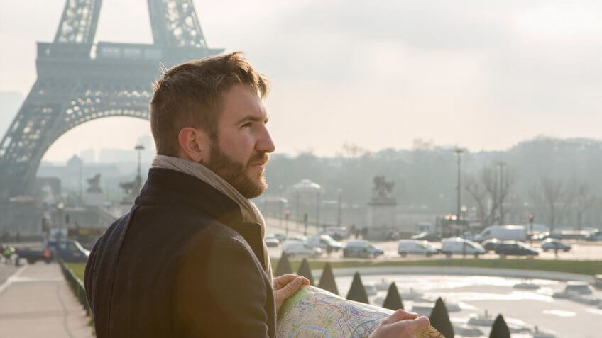 young man traveling in Paris