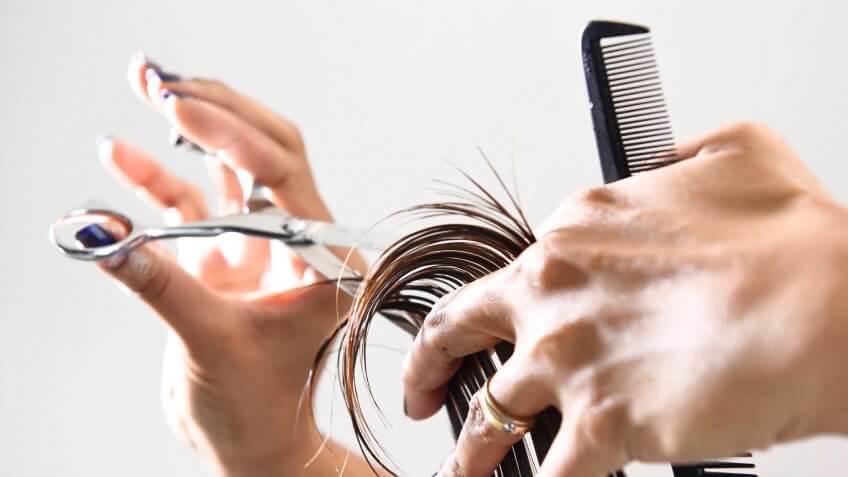 cutting hair with scissors