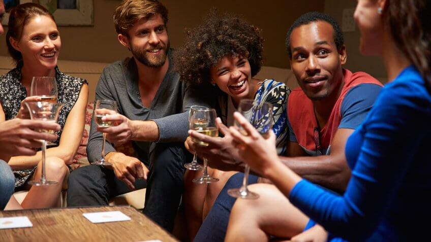 friends drinking at home together
