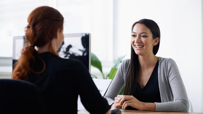female employee talking to boss