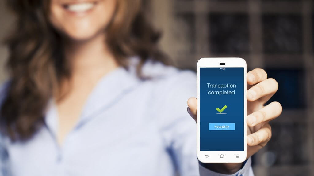 Automate Savings woman showing a completed bank transaction notice on her phone