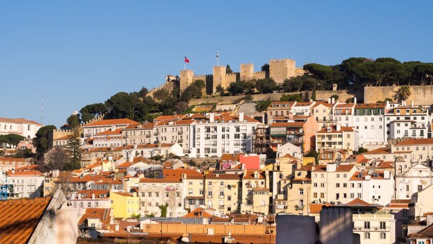 Sao Jorge Castle in Lisbon, with surrounding architecture.