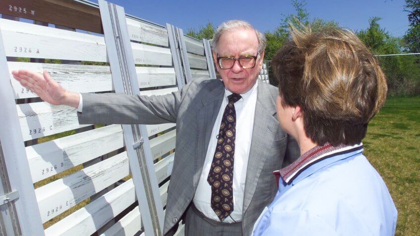 Warren Buffett down on the farm, Benjamin Moore's test farm that is, in Flanders, N.
