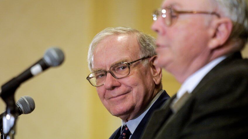 404962 01: Warren Buffett (L) and Berkshire-Hathaway partner Charlie Munger address members of the media May 5, 2002 in Omaha, Nebraska following the annual shareholders meeting.