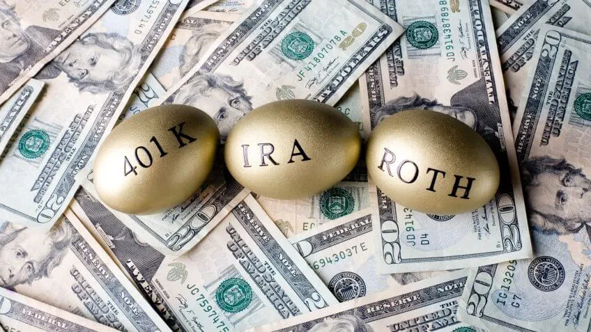 golden eggs with 401k ira and roth painted on them