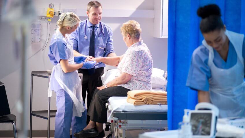 woman with a nurse and a doctor