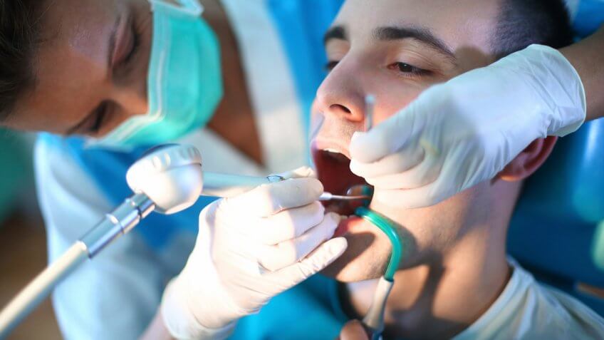 young man getting dental work done