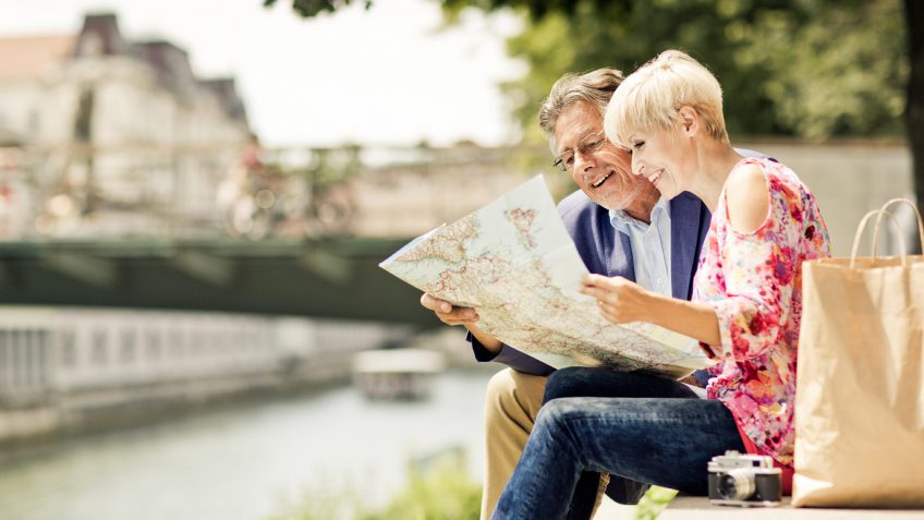 older couple looking at a map