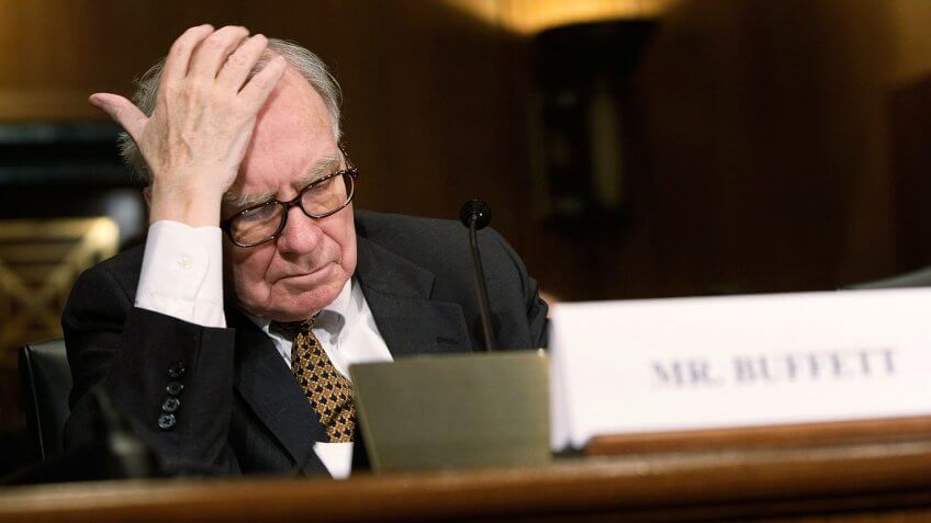 WASHINGTON - NOVEMBER 14: Berkshire Hathaway Chairman and CEO Warren Buffett pauses prior to a hearing before the Senate Finance Committee November 14, 2007 on Capitol Hill in Washington, DC.